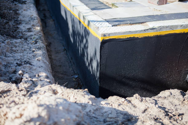 Professional Exterior Waterproofing technician working in Bayou La Batre, AL